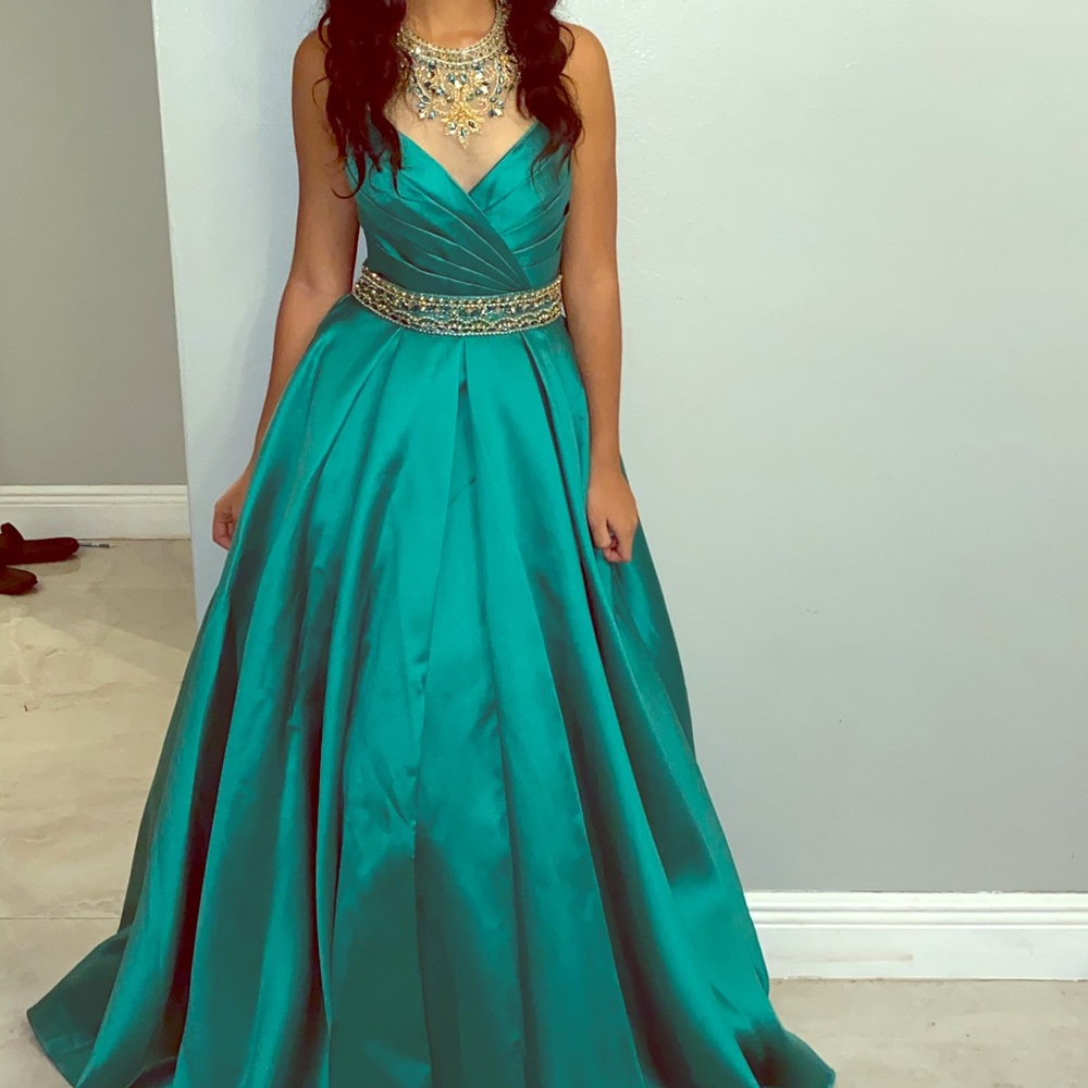 A green Camille La Vie dress